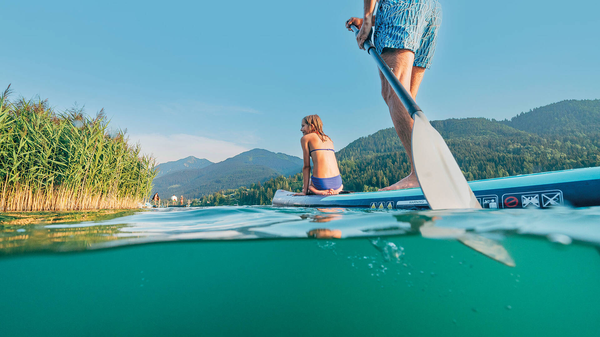 Mit dem Stand up paddle am Weissensee unterwegs